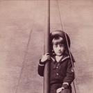 Boy on ship's mast